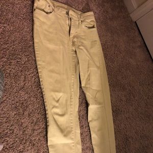 Pale yellow size 26 Levi’s jeans. Lightly worn